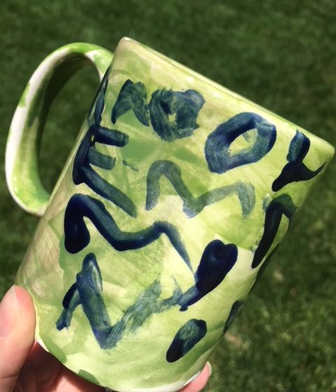 Ceramic coffee mug hand-painted by a child